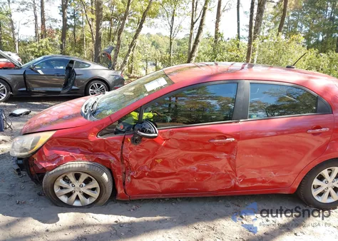 2014 Kia Rio Ex z USA, uszkodzony, nr VIN KNADN5A38E6410359